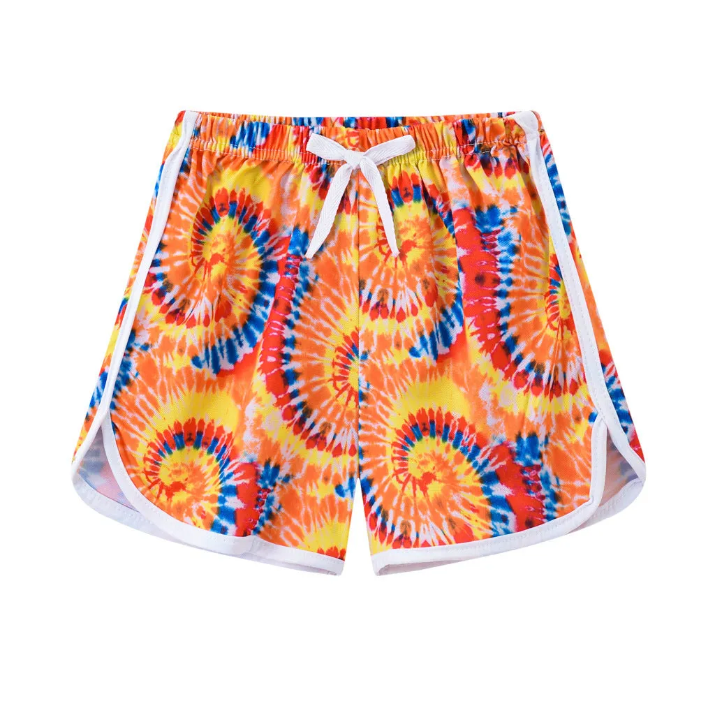 Children's polyester holiday shorts in multiple colours and patterns with height sizing from 100 to 140cm