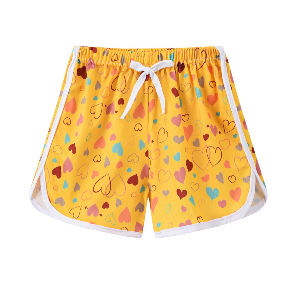 Children's polyester holiday shorts in multiple colours and patterns with height sizing from 100 to 140cm