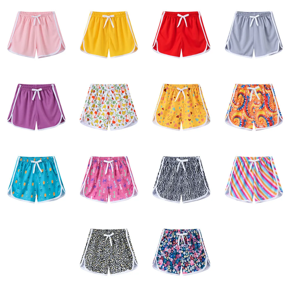 Children's polyester holiday shorts in multiple colours and patterns with height sizing from 100 to 140cm