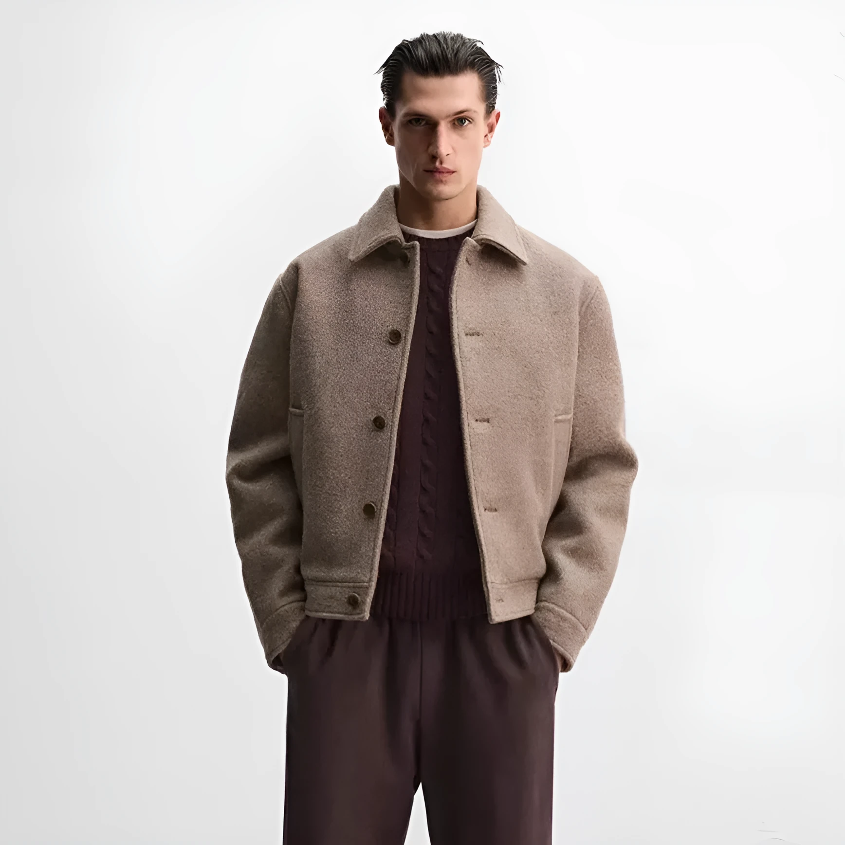 Men's taupe loose wool woven lapel long sleeve single-breasted casual jacket coat on a model