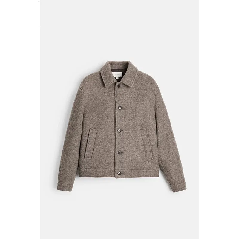 Men's taupe loose wool woven lapel long sleeve single-breasted casual jacket coat on a model
