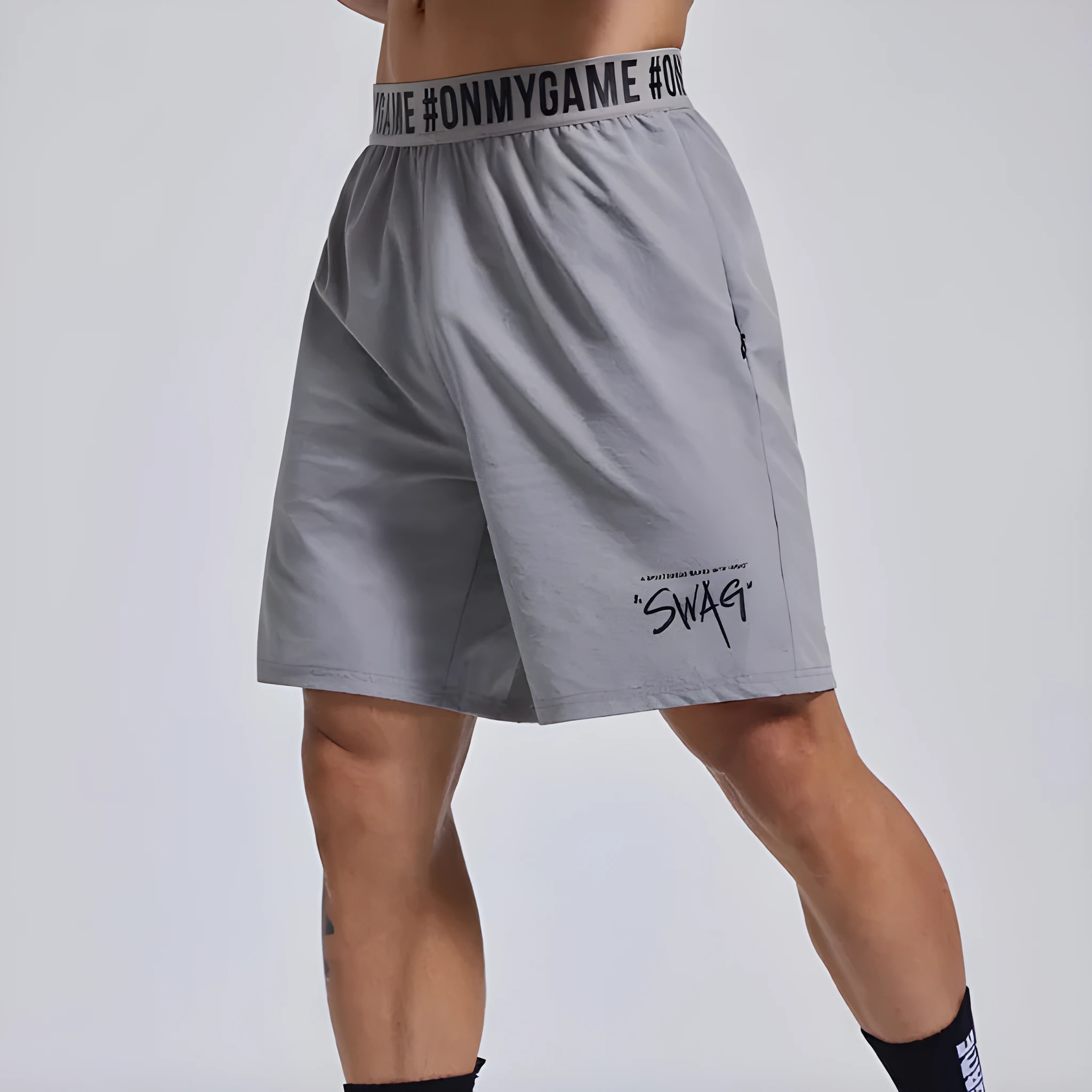 Men's loose black sports shorts with an elastic waistband and printed letter design.