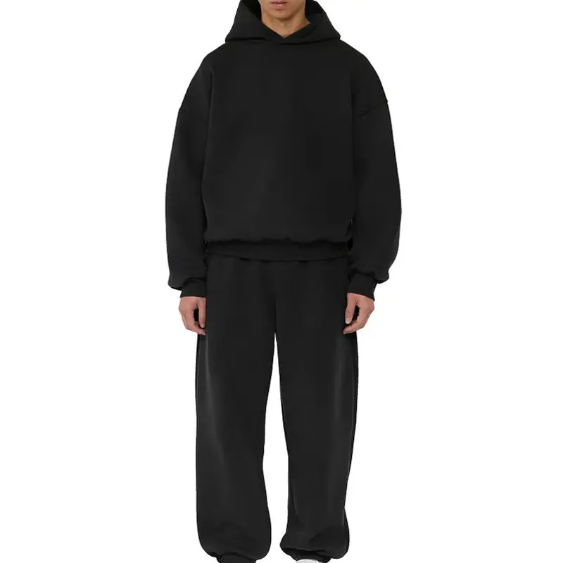 A man's solid-colour fleece-lined cotton hoodie with a wool interior, shown in a casual setting.