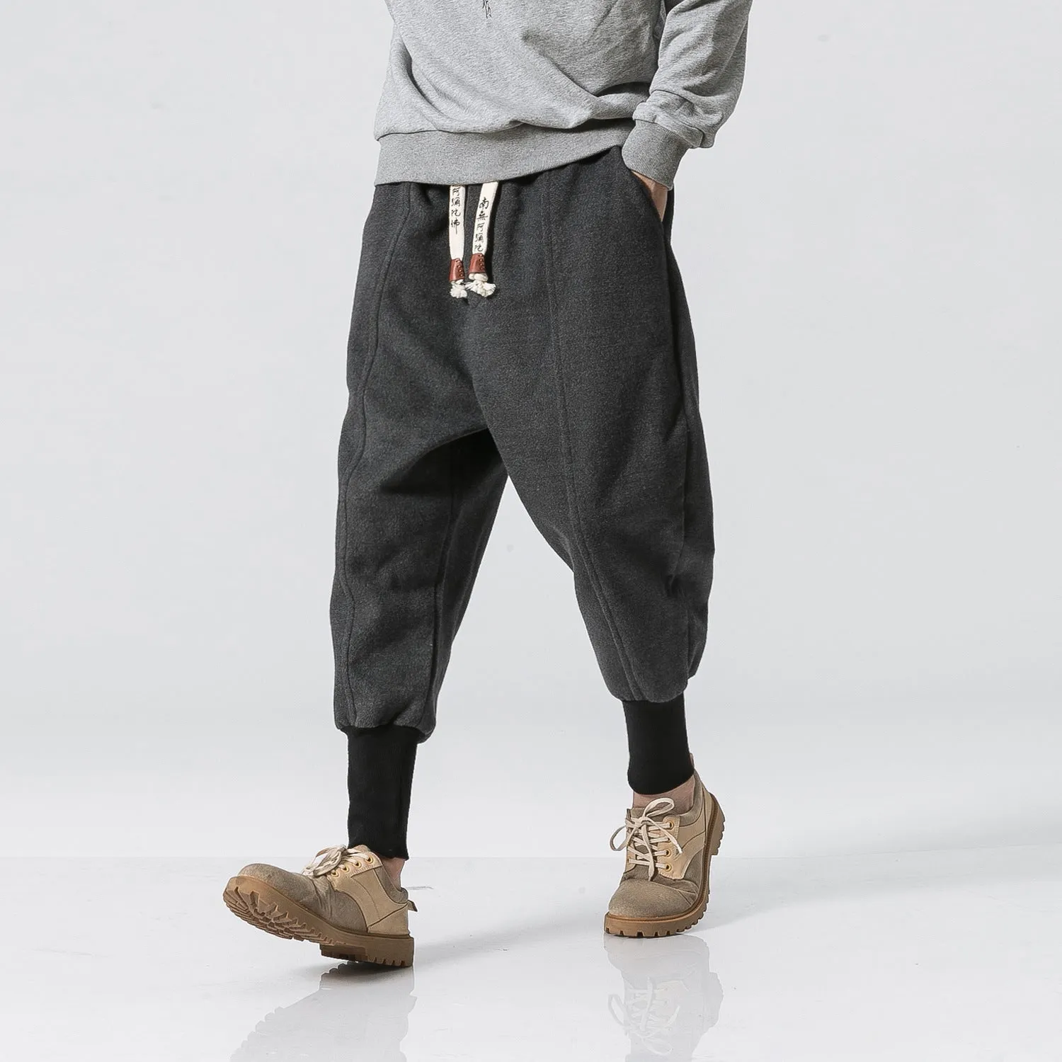 Teen loose fit harem casual pants in dark grey with elastic waist and slant pockets
