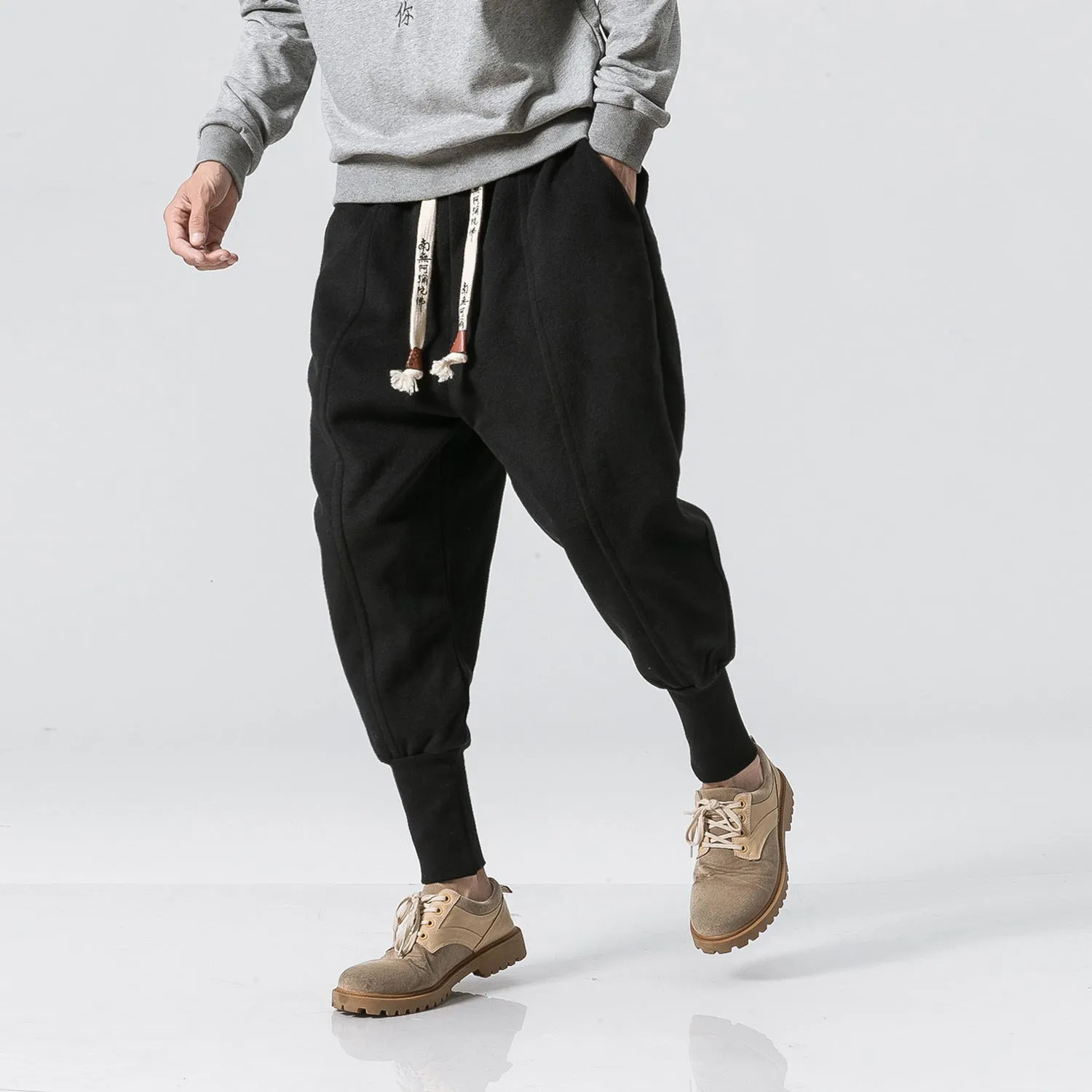 Teen loose fit harem casual pants in dark grey with elastic waist and slant pockets