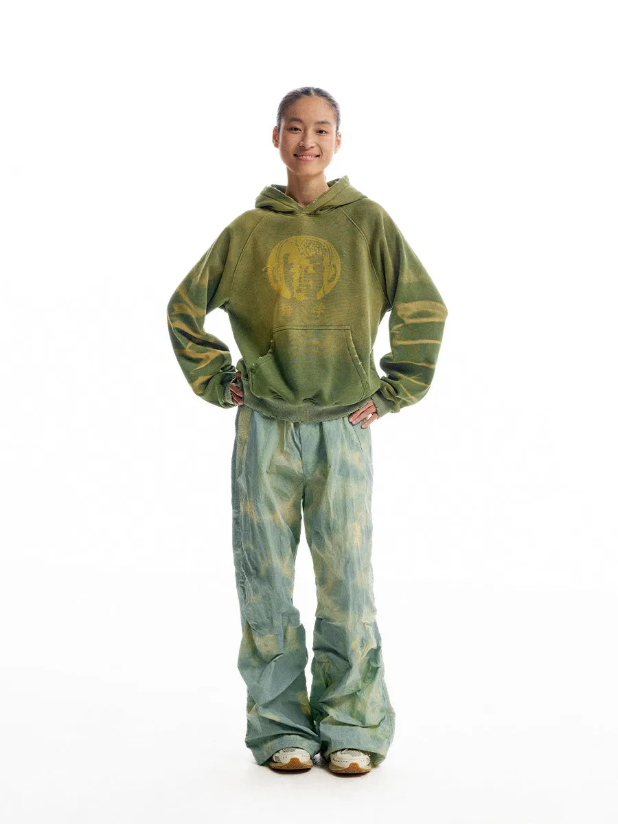 Green loose-fit hooded velvet cardigan with long sleeves, front view, featuring Science And Reason Buddha print