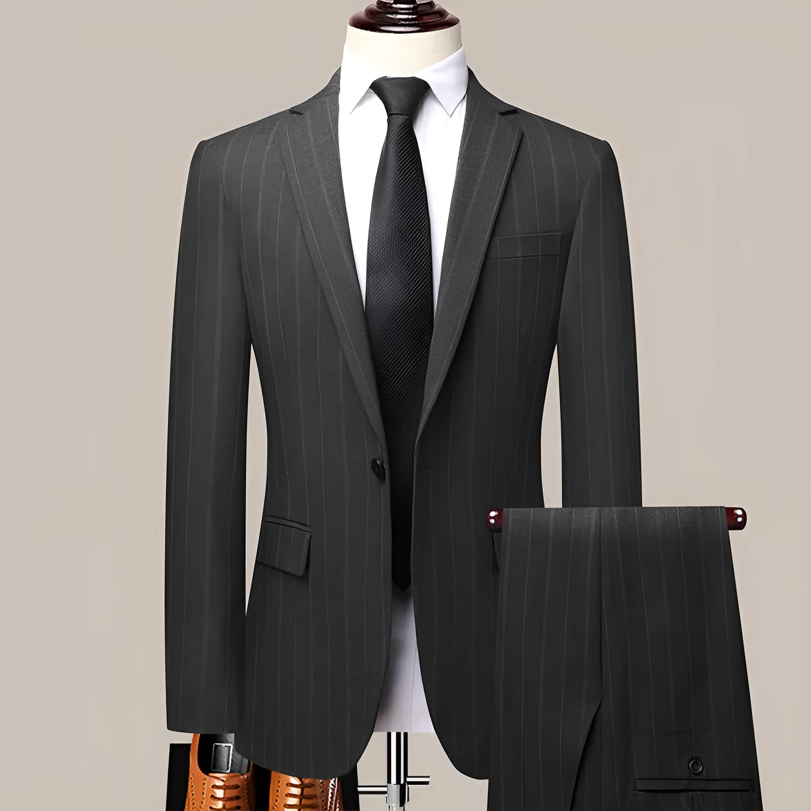 Grey slim-fit men's striped suit set with coat, vest, and trousers on hanger