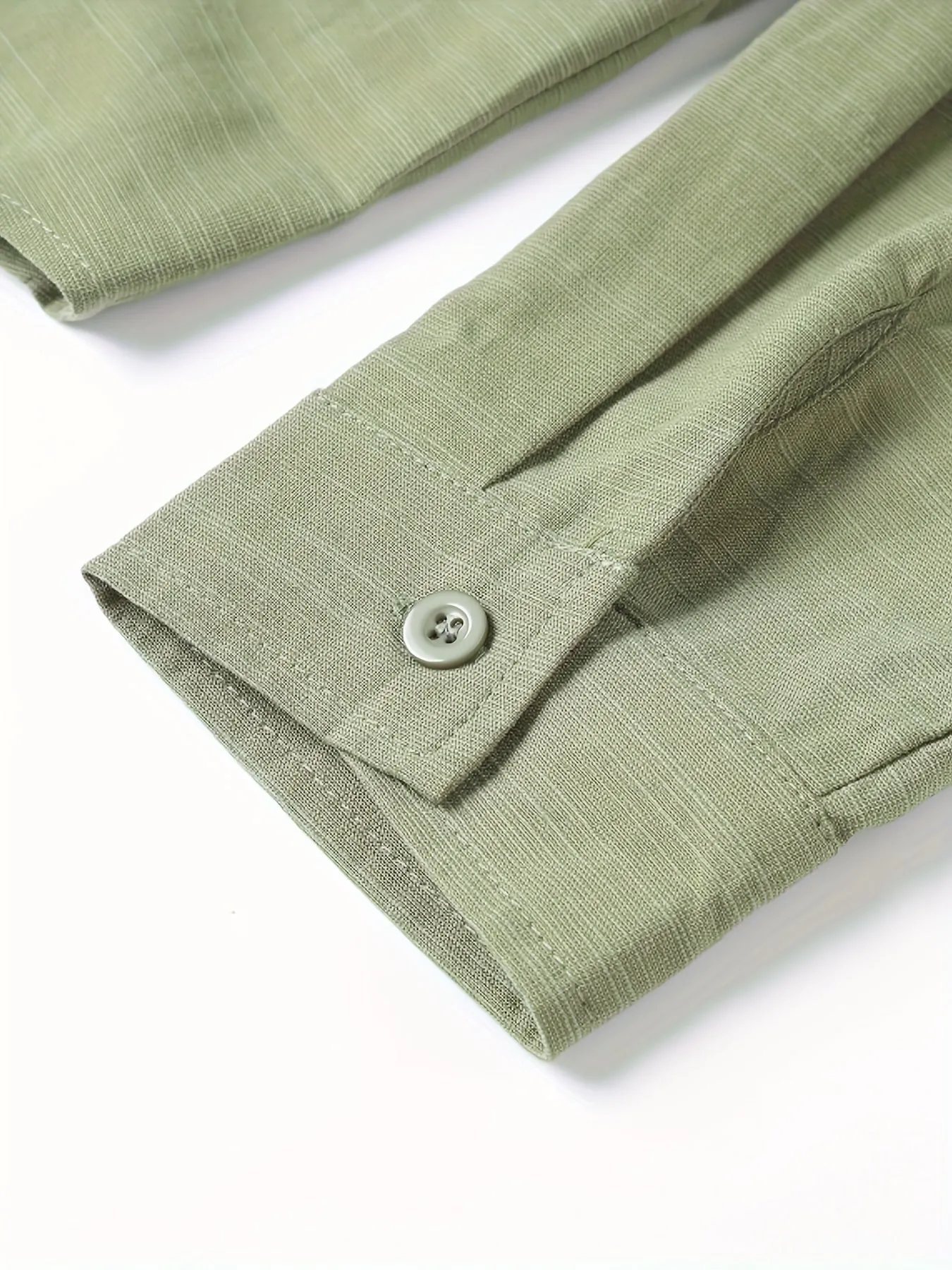 Light green linen men's casual shirt with lapel collar and long sleeves, front view