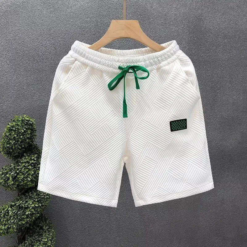 Men's solid colour casual sports shorts with micro elasticity in white, black, or green options