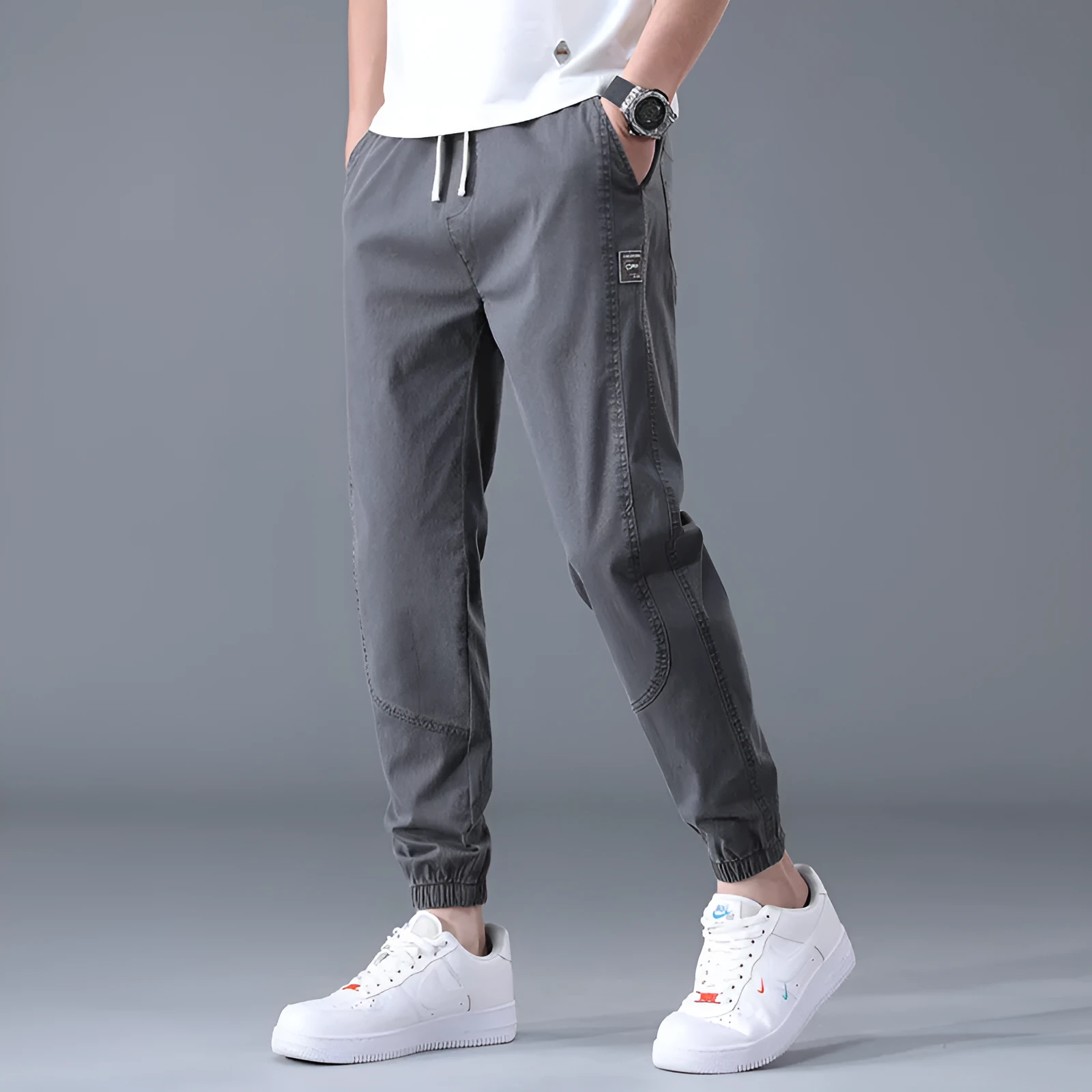 Men's casual loose drawstring pants in black, tapered high-waist solid colour cotton-blend trousers