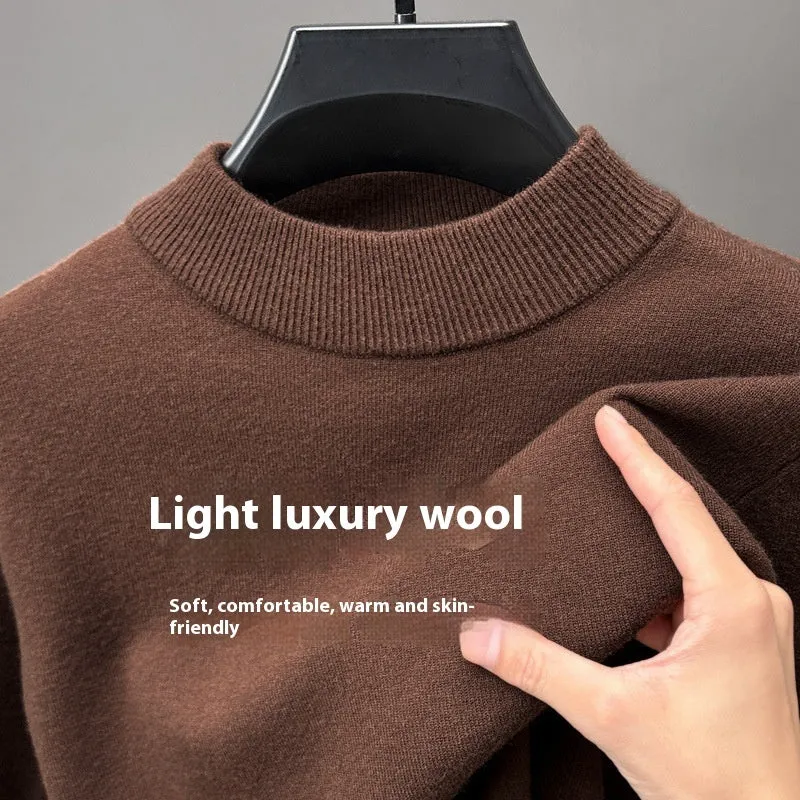 Men's fine yarn half turtleneck sweater in a solid colour on a hanger