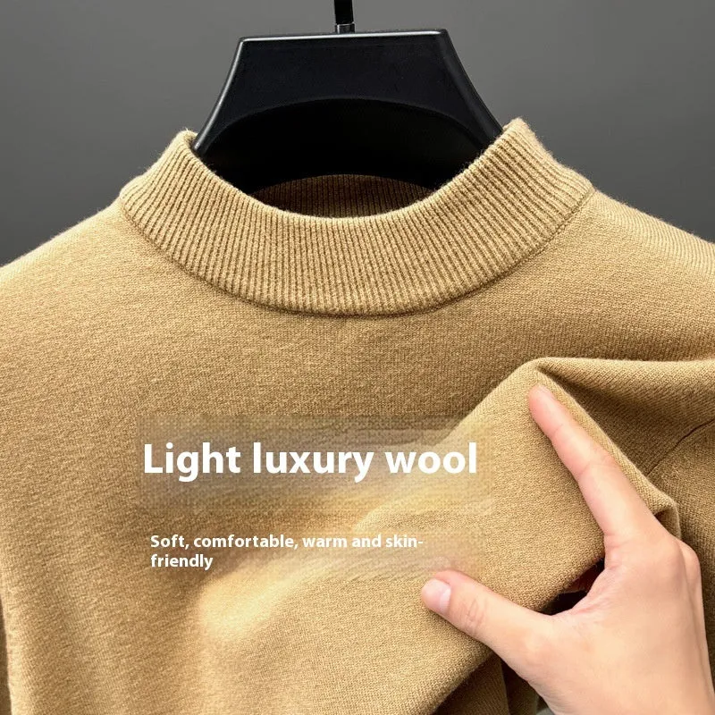 Men's fine yarn half turtleneck sweater in a solid colour on a hanger