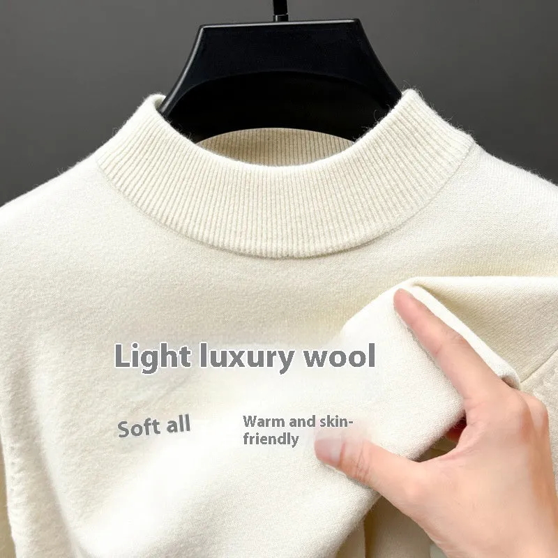Men's fine yarn half turtleneck sweater in a solid colour on a hanger