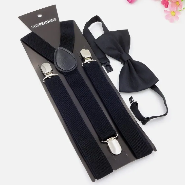 Men's back tie bow tie suspenders set in elastic webbing with snap fastening showing navy colour on a plain background