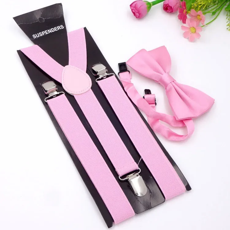Men's back tie bow tie suspenders set in elastic webbing with snap fastening showing navy colour on a plain background