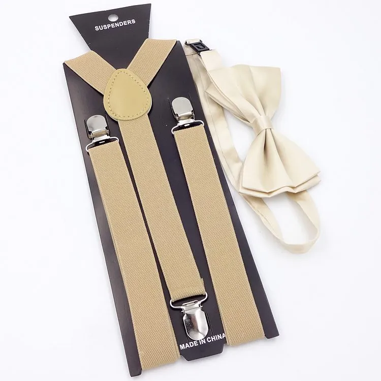 Men's back tie bow tie suspenders set in elastic webbing with snap fastening showing navy colour on a plain background