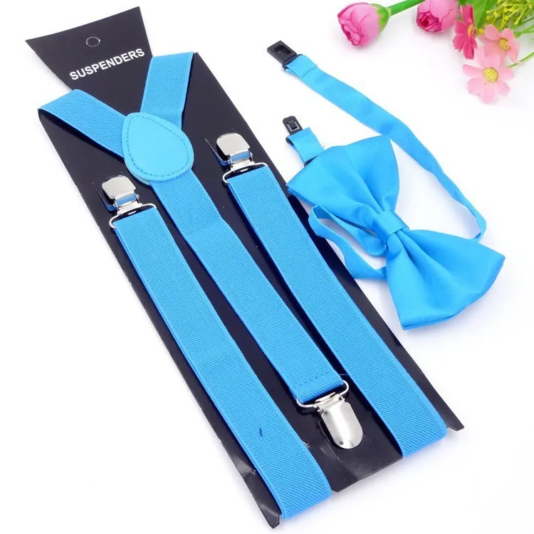 Men's back tie bow tie suspenders set in elastic webbing with snap fastening showing navy colour on a plain background