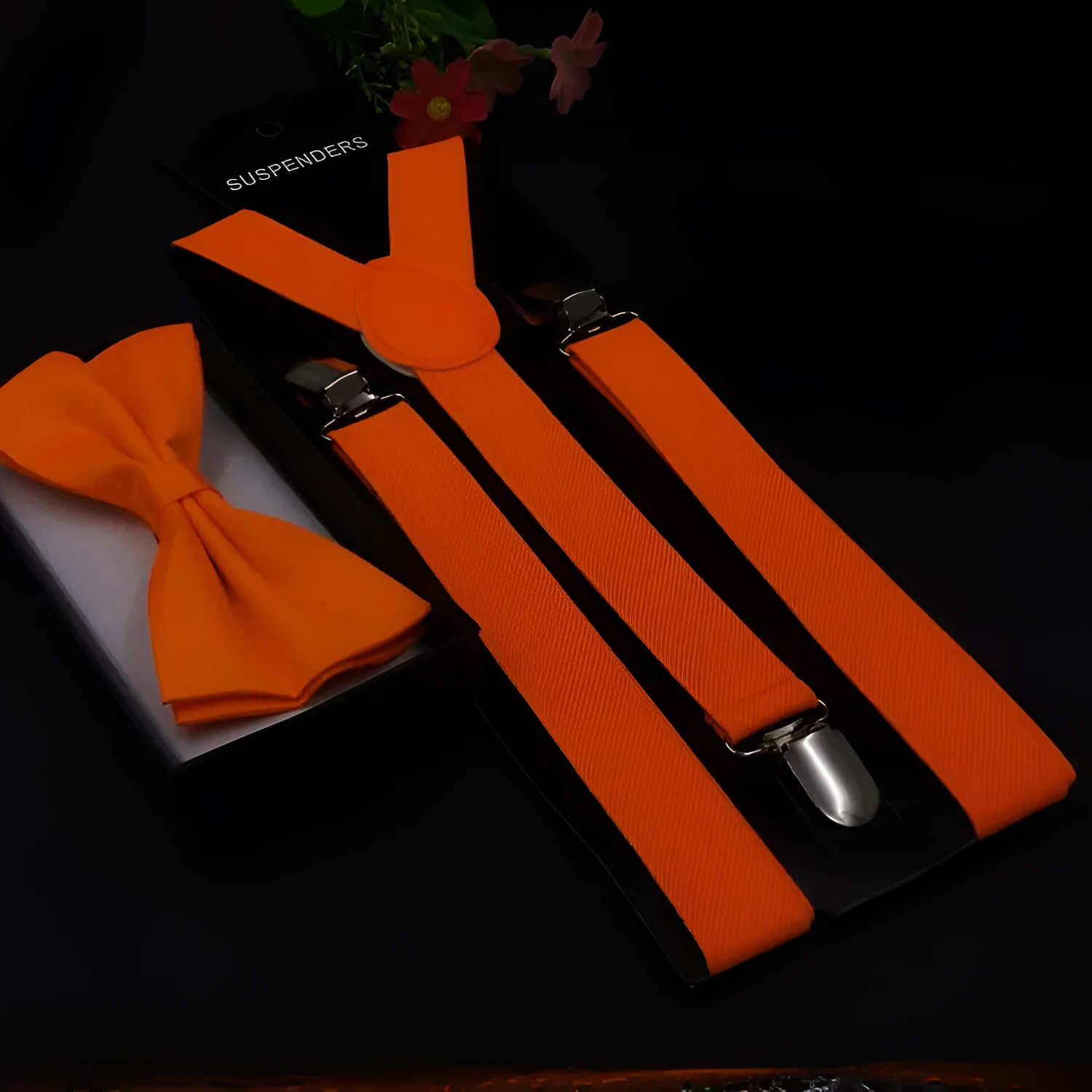 Men's back tie bow tie suspenders set in elastic webbing with snap fastening showing navy colour on a plain background