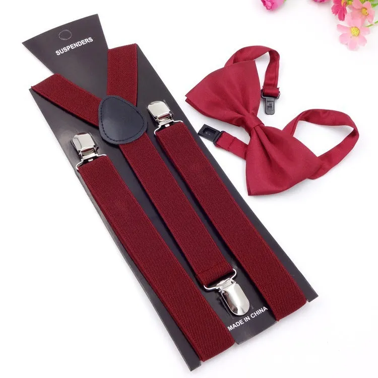 Men's back tie bow tie suspenders set in elastic webbing with snap fastening showing navy colour on a plain background