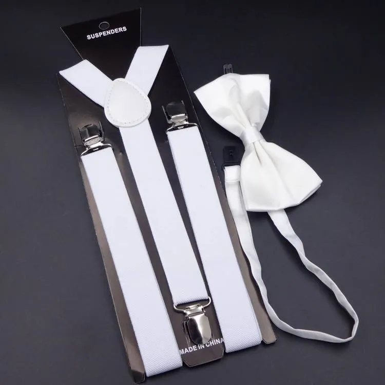 Men's back tie bow tie suspenders set in elastic webbing with snap fastening showing navy colour on a plain background