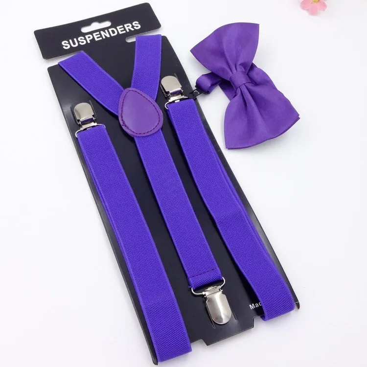 Men's back tie bow tie suspenders set in elastic webbing with snap fastening showing navy colour on a plain background