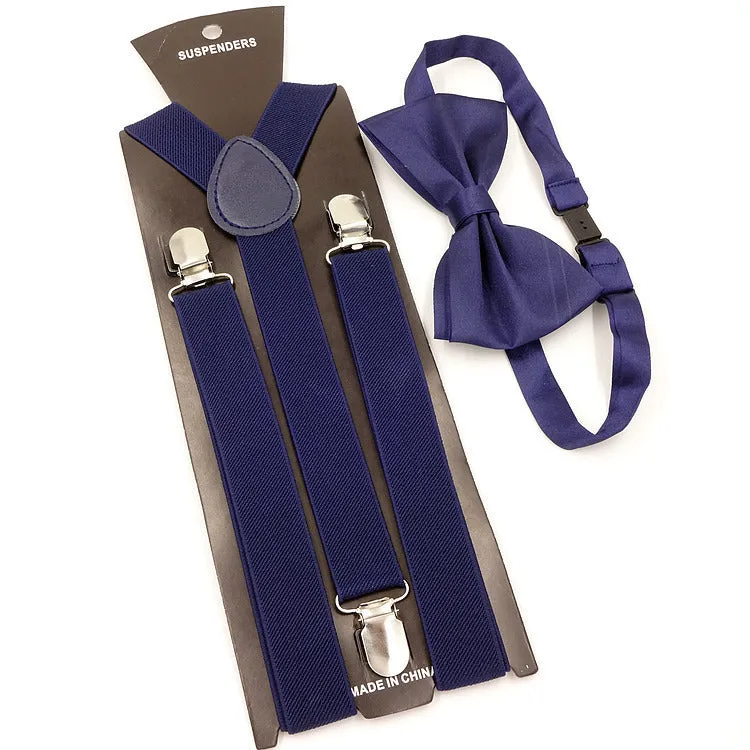 Men's back tie bow tie suspenders set in elastic webbing with snap fastening showing navy colour on a plain background