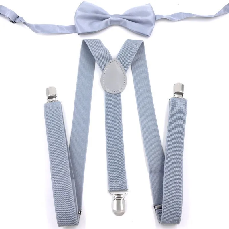 Men's back tie bow tie suspenders set in elastic webbing with snap fastening showing navy colour on a plain background