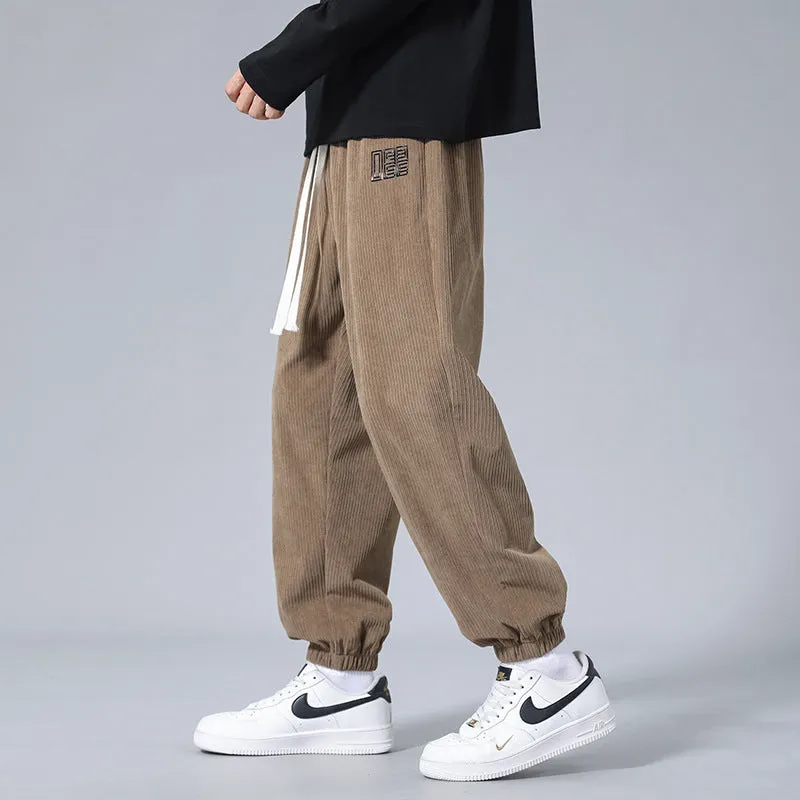 Men's workwear casual sports trousers in dark gray with letter print, polyester fibre, side view