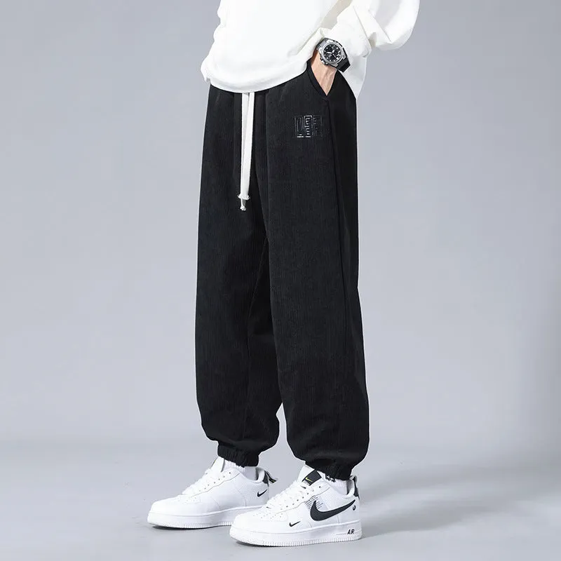 Men's workwear casual sports trousers in dark gray with letter print, polyester fibre, side view
