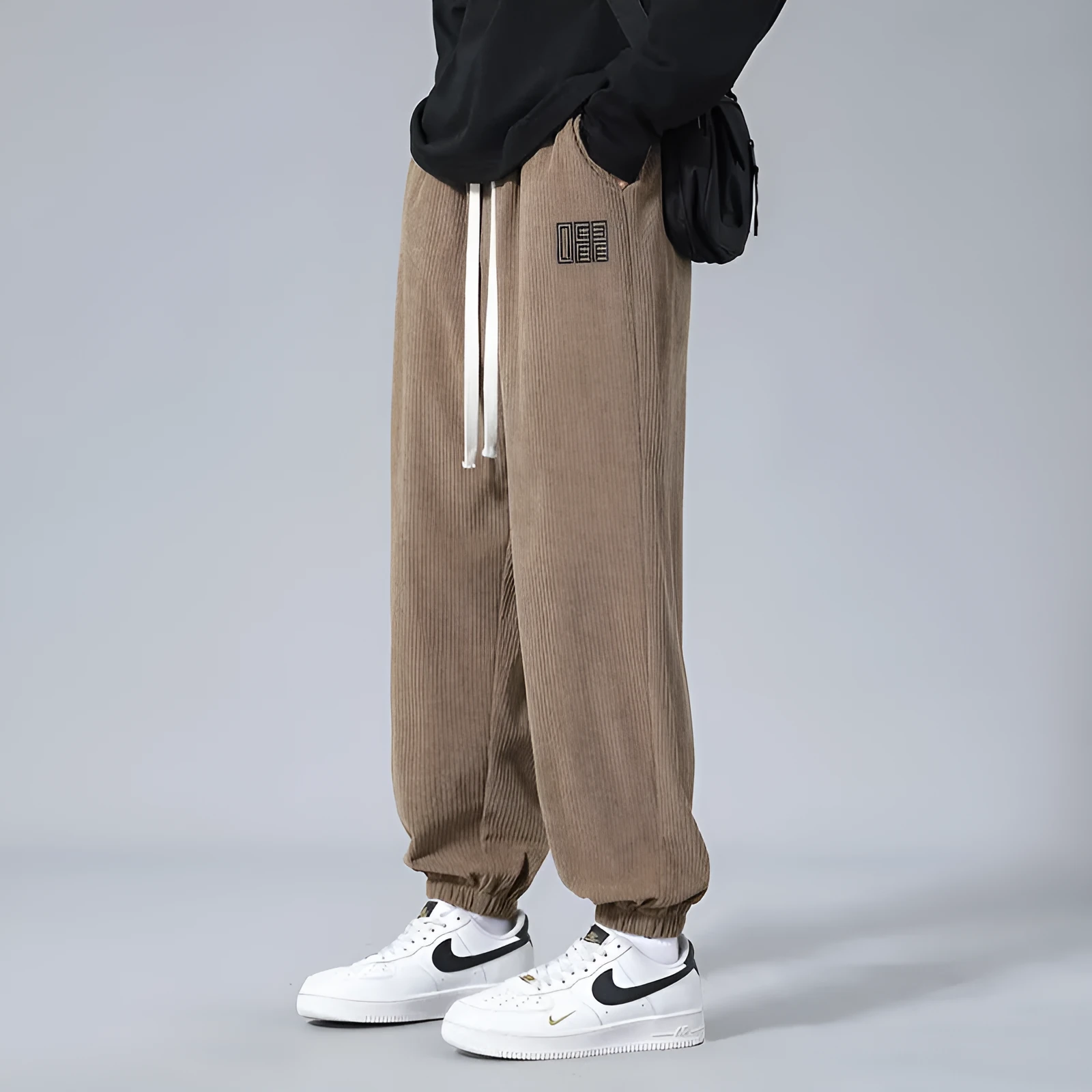 Men's workwear casual sports trousers in dark gray with letter print, polyester fibre, side view