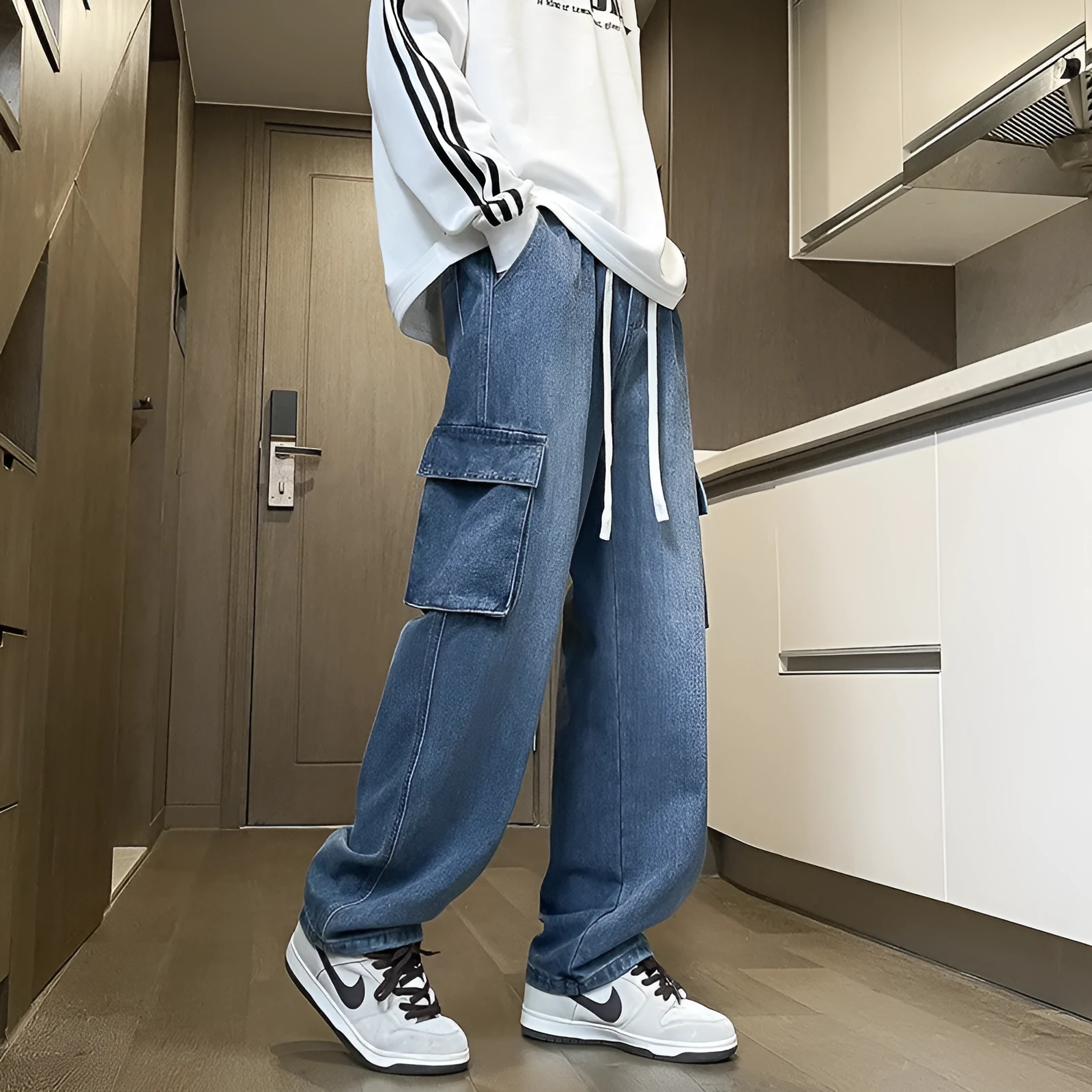 Men's cotton straight leg jeans in light blue, size M-3XL, simple workwear style for spring