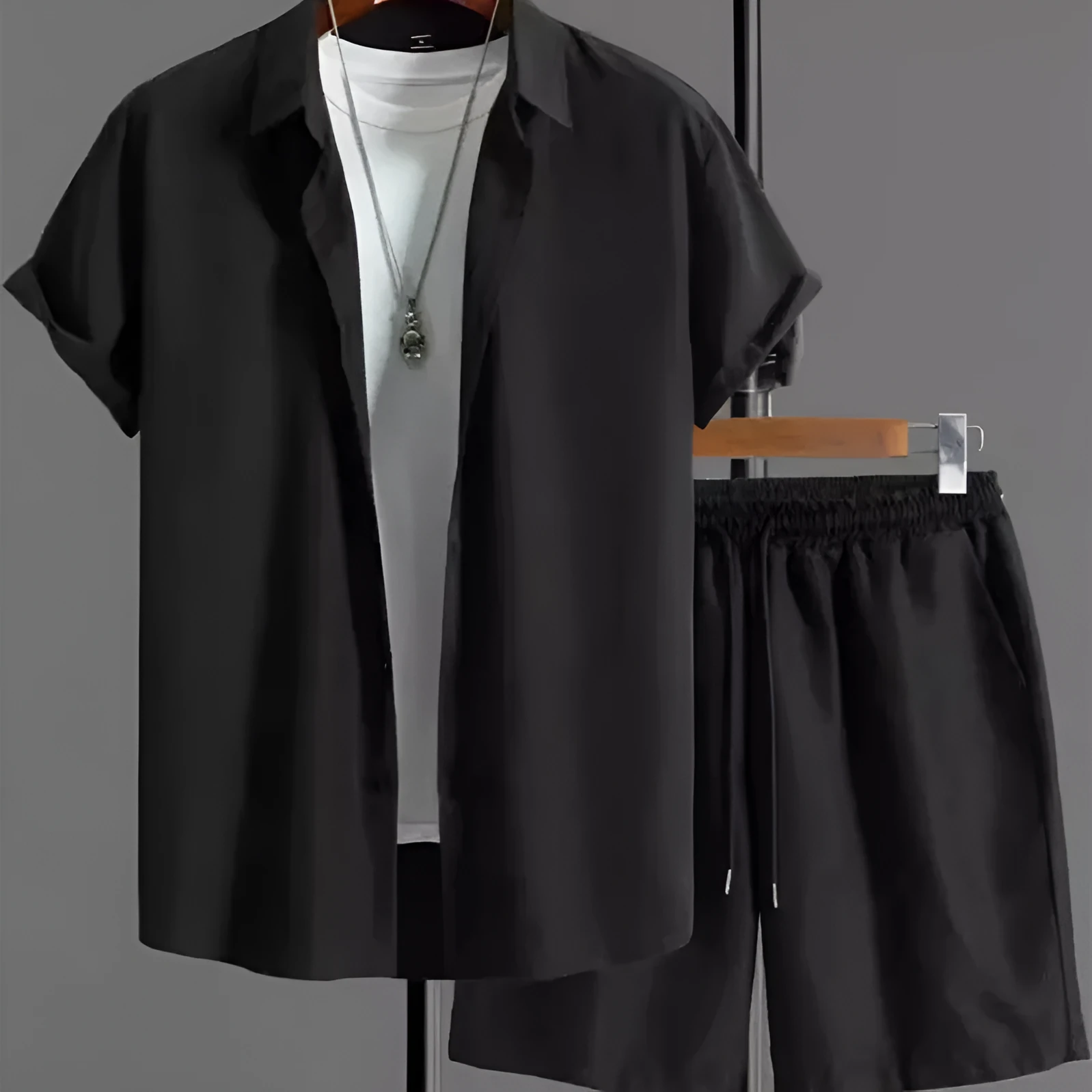 Short sleeve jacquard suit set with shorts in solid colour on a hanger