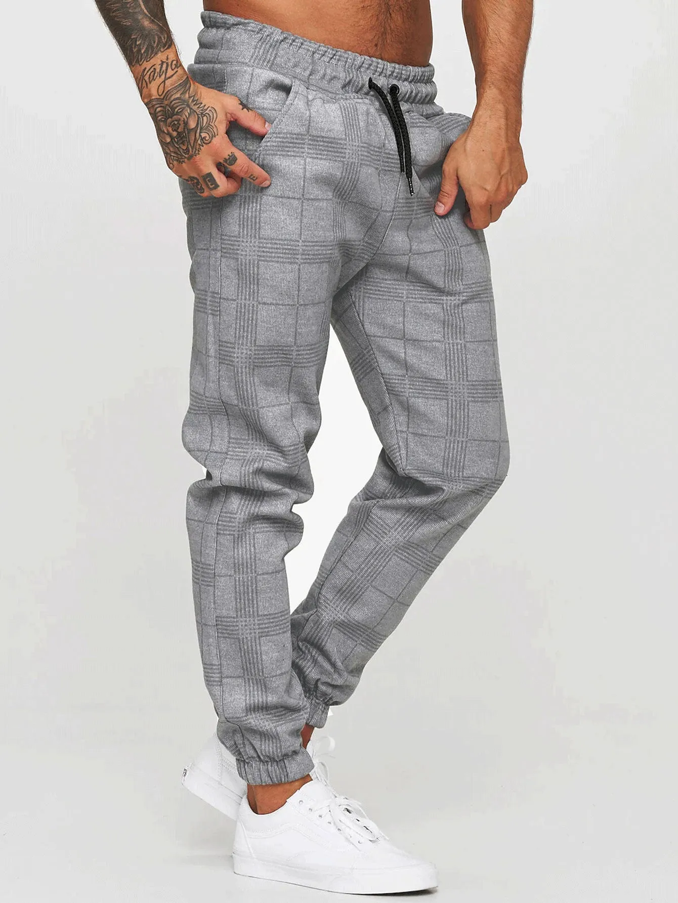Cotton printed casual tapered trousers for men in black side view