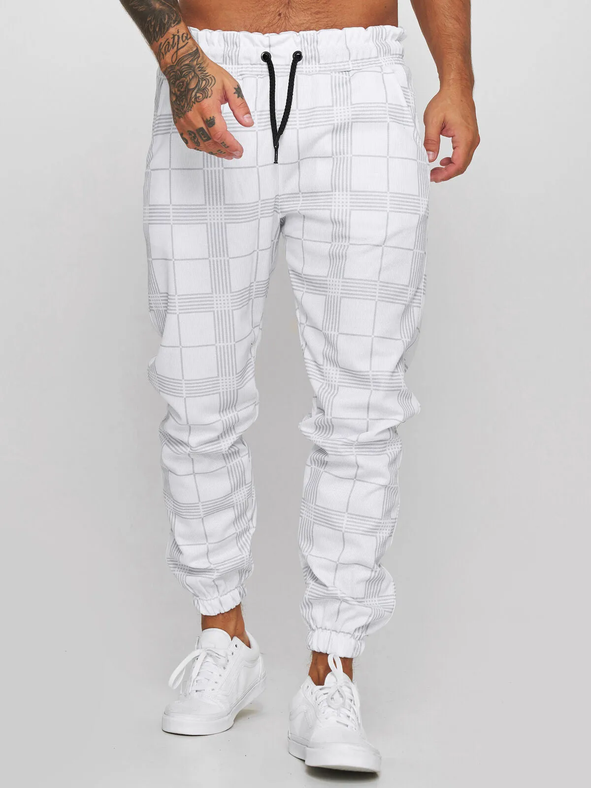 Cotton printed casual tapered trousers for men in black side view