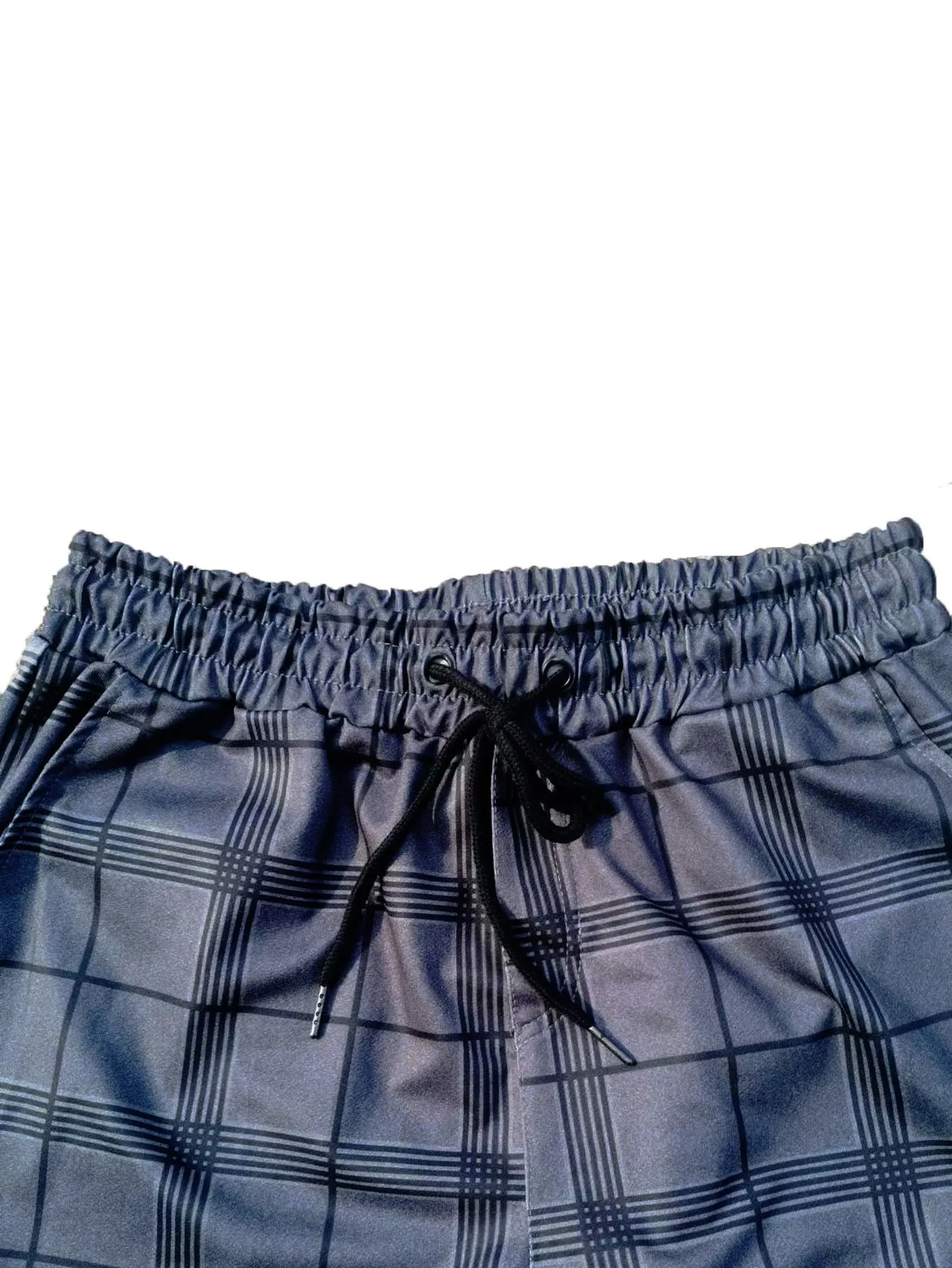 Cotton printed casual tapered trousers for men in black side view