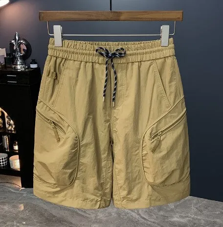 Man wearing loose-fit camouflage cargo shorts with cargo pockets and an elasticated waistband.