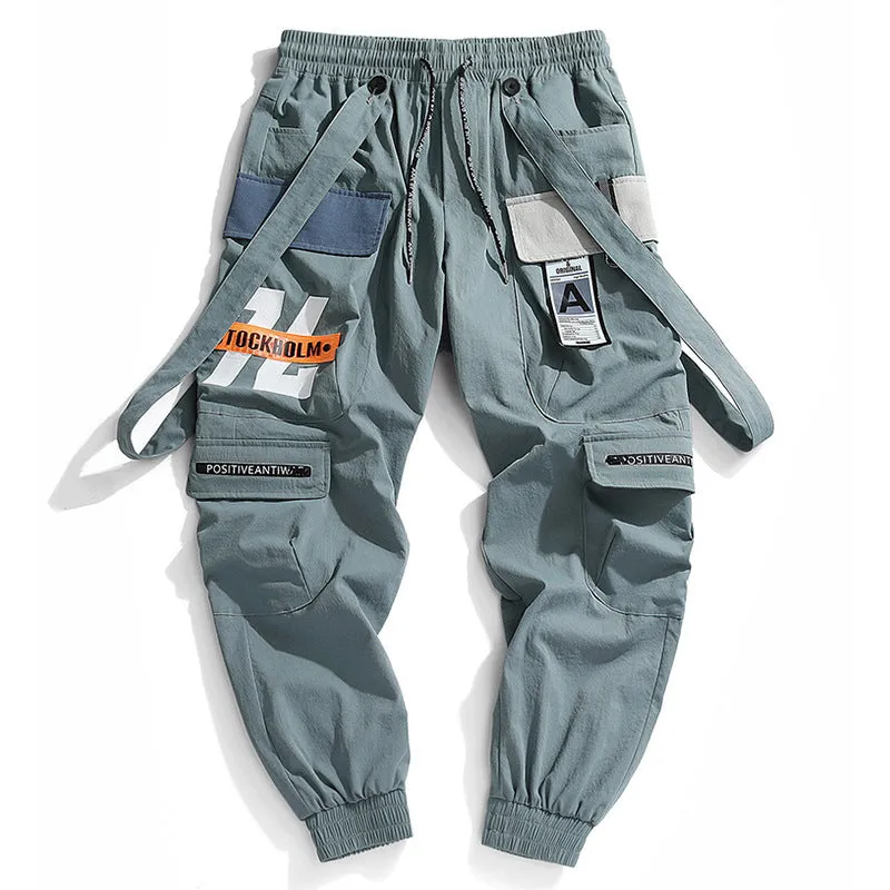 Men's Hong Kong fashion workwear casual pants with multi-pockets, loose fit, zip fly, in Black colour, T400 fabric