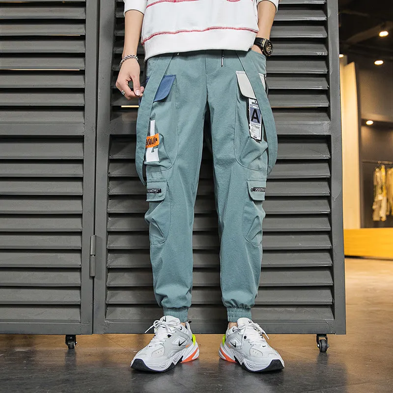 Men's Hong Kong fashion workwear casual pants with multi-pockets, loose fit, zip fly, in Black colour, T400 fabric