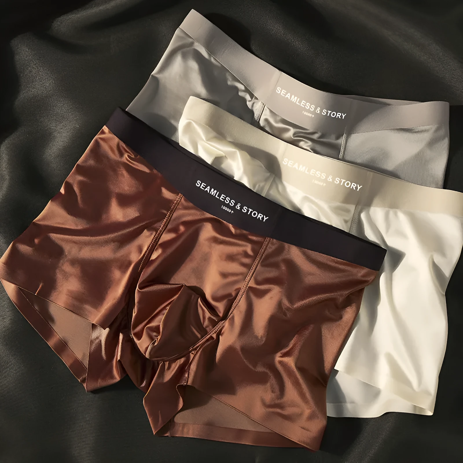 Men's ice silk satin traceless underwear in mid-waist brief style showing solid colour options