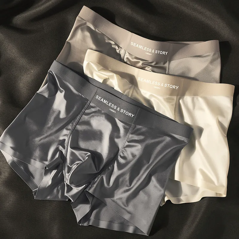 Men's ice silk satin traceless underwear in mid-waist brief style showing solid colour options