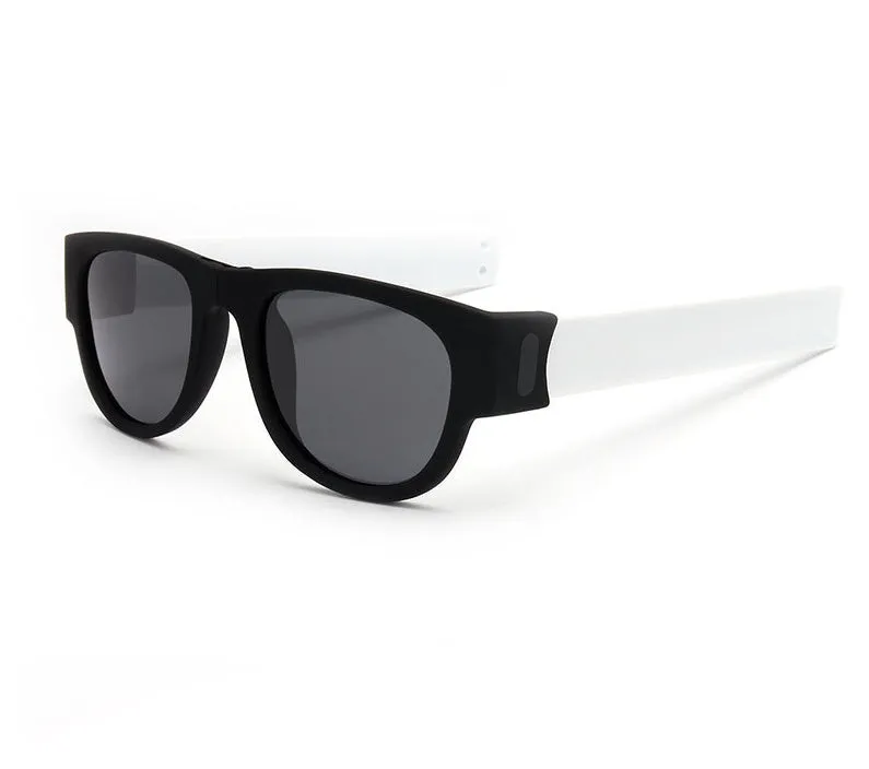 Folding polarised sports sunglasses on wristband bracelet, available in multiple colours