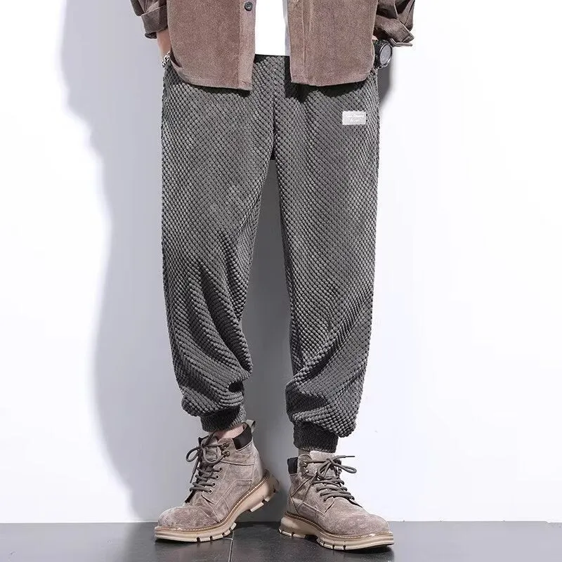 Men's grey ankle-tied casual sport sweatpants with straight leg design on hanger