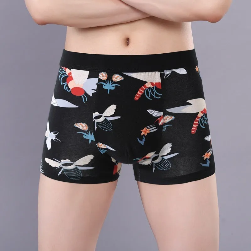 Men's floral print cotton boxer shorts showing the U-shaped pouch design and available colour variations.