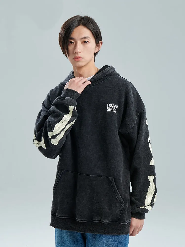 Black printed hoodie with hood and loose fit, 100% cotton, front view