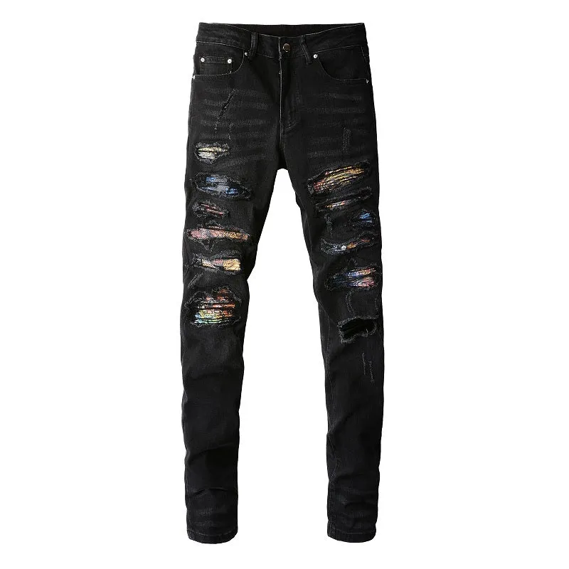 Men's black denim jeans with tattered hem and simple print patch detail