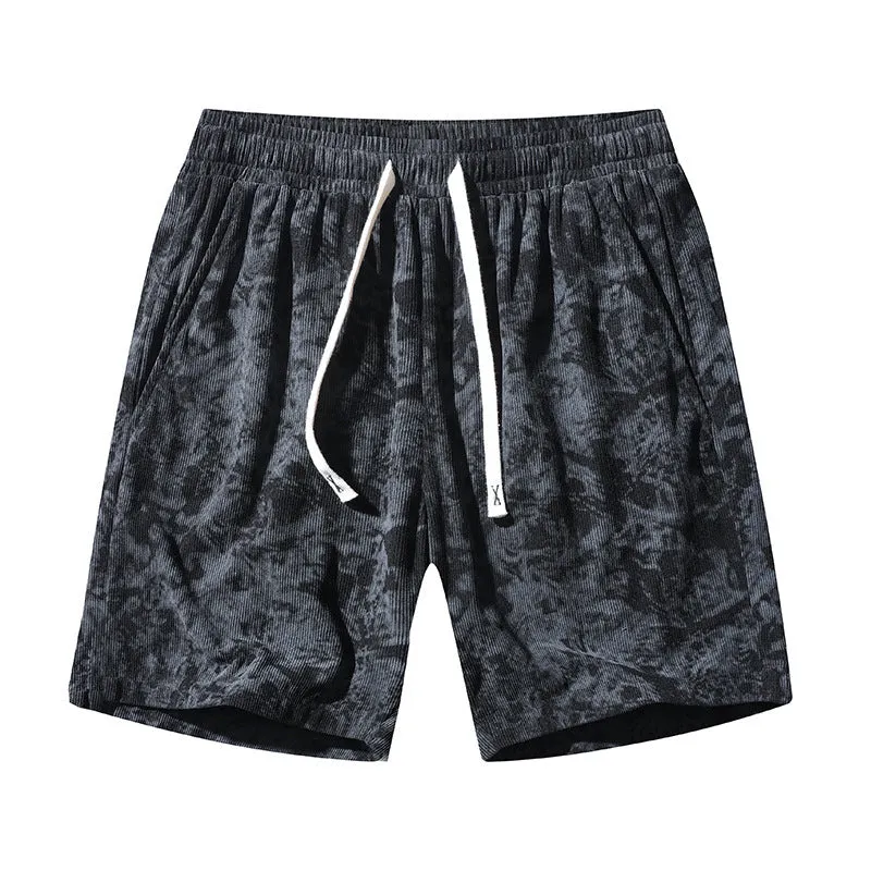 Men's camouflage pattern corduroy athletic shorts with a high waist on a neutral background.
