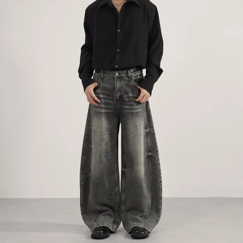 Men's denim straight leg jeans in black and gray washed finish with zip fly