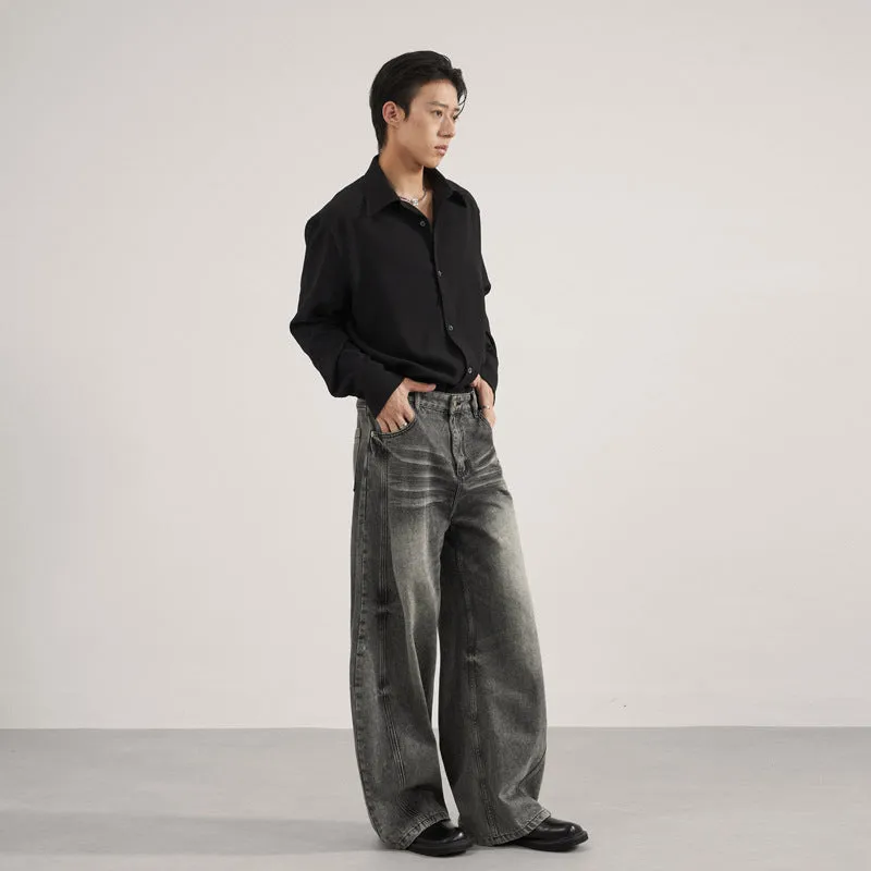 Men's denim straight leg jeans in black and gray washed finish with zip fly