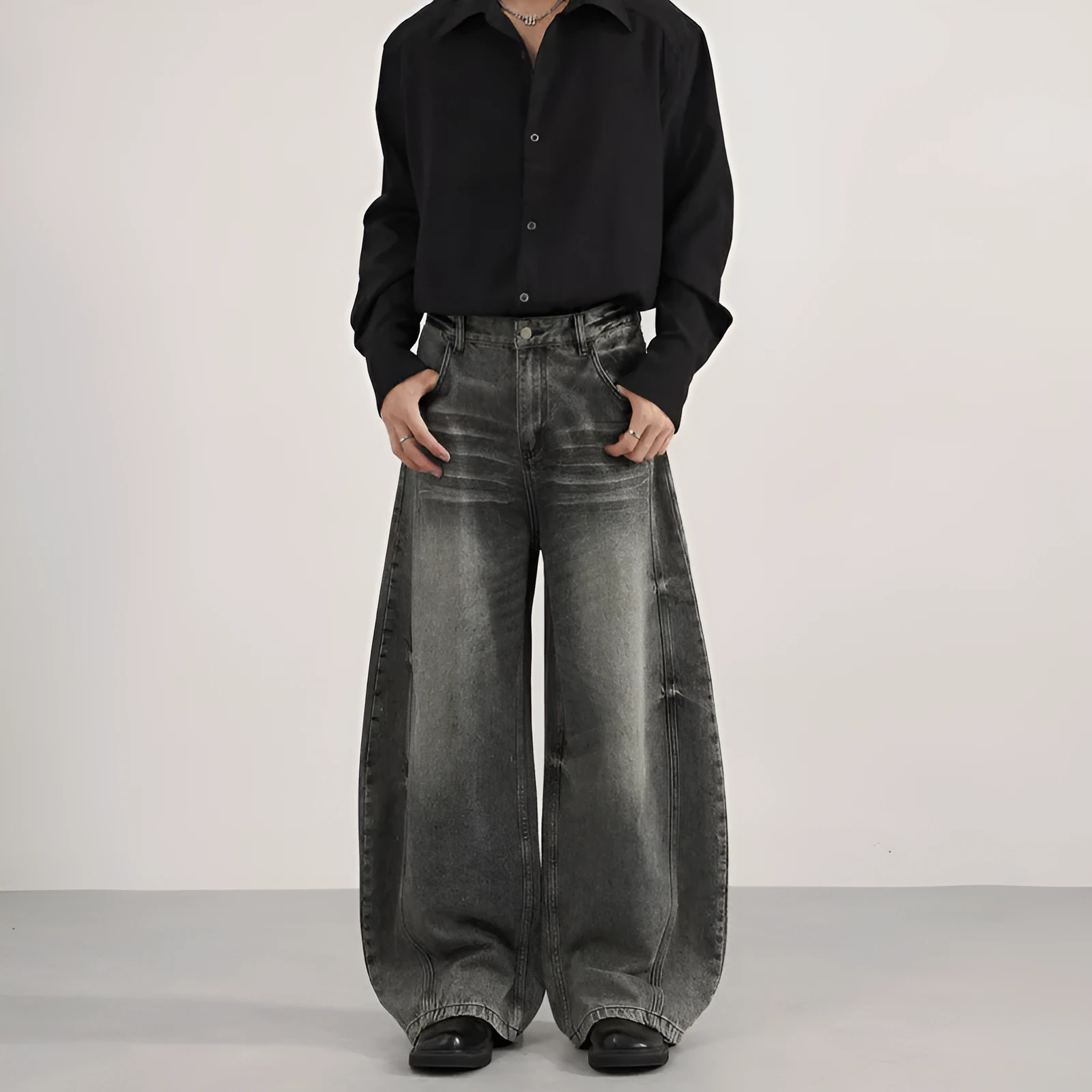 Men's denim straight leg jeans in black and gray washed finish with zip fly