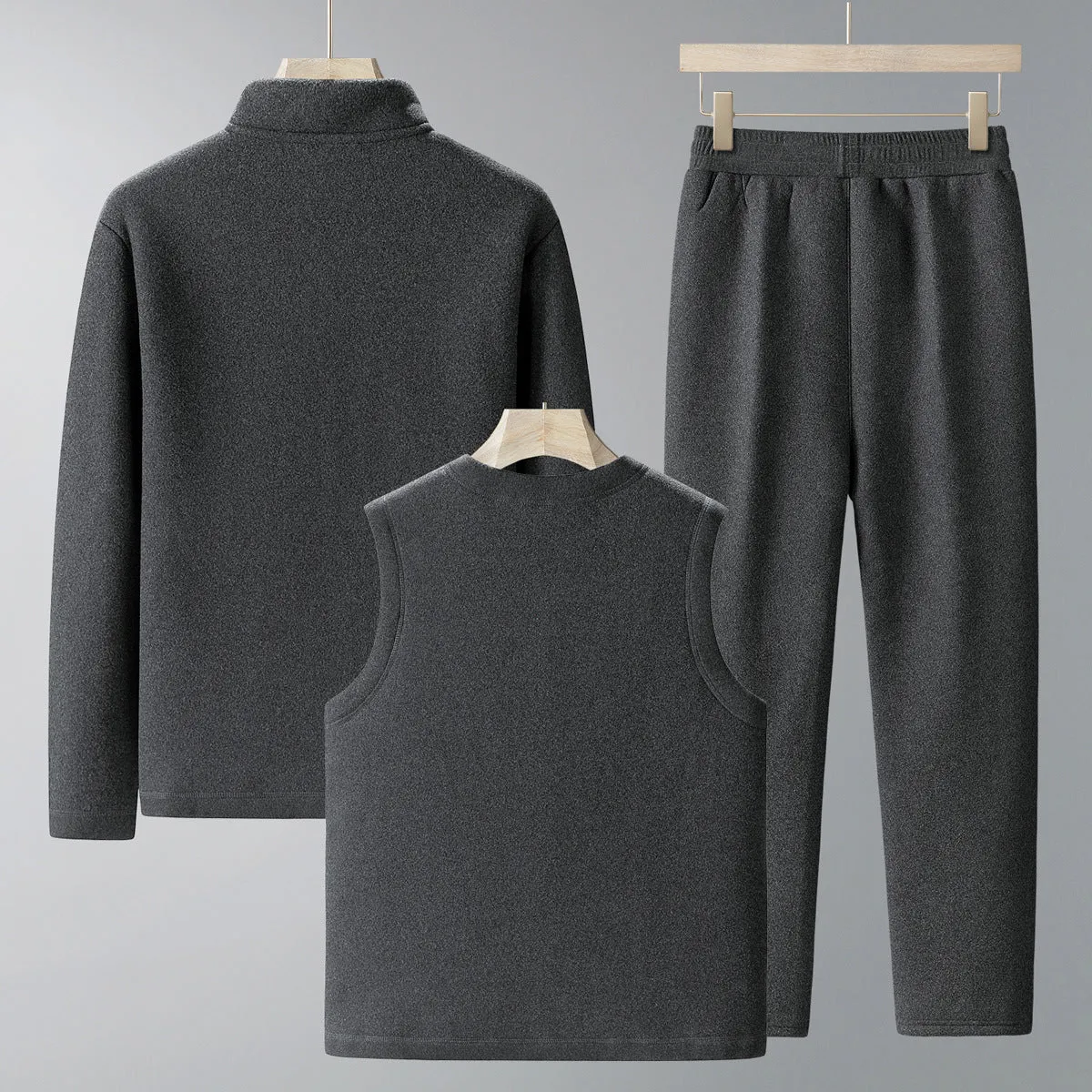 Men wearing dark gray velvet sport suit with long-sleeve jacket and trousers, wool lined winter tracksuit